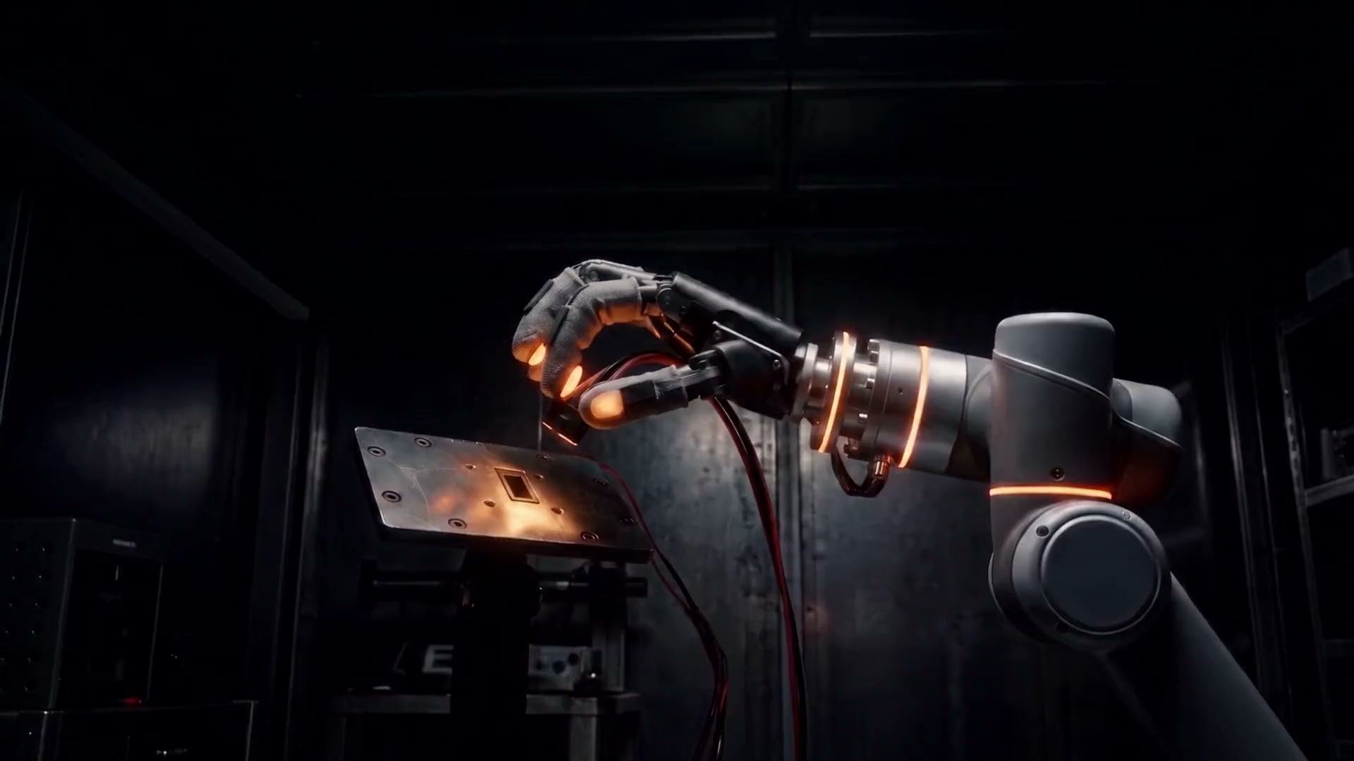 Morpheus concept: a robot hand connected by orange contact-sensing light in the hero film’s final frame.